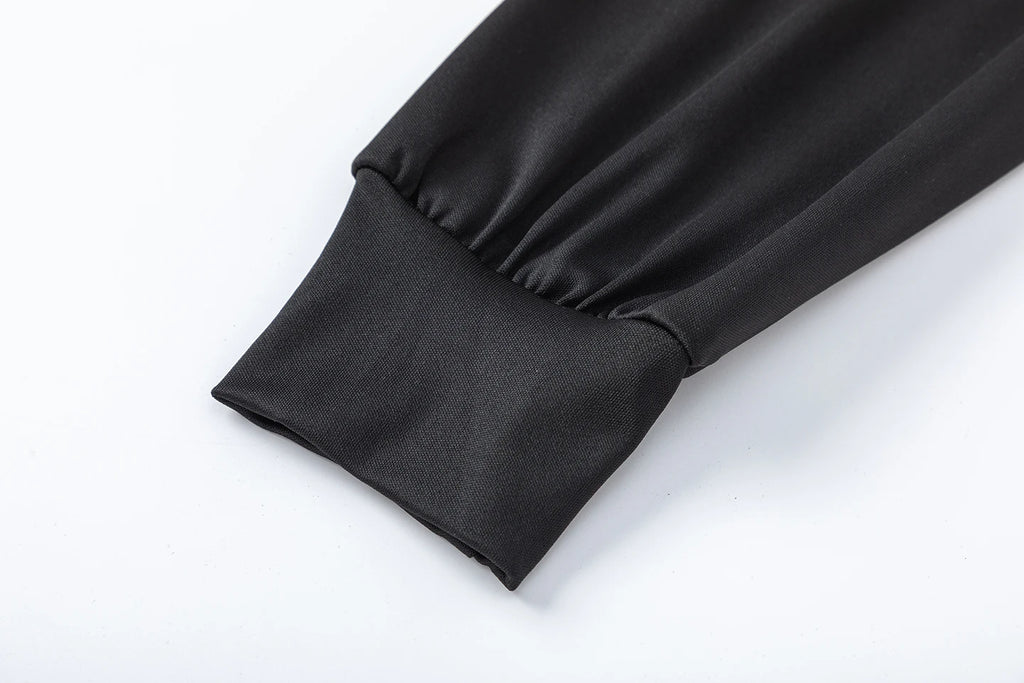 A set designed with a smooth long‑sleeved top